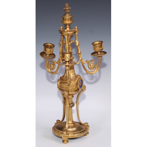 390 - A pair of 19th century French porcelain mounted gilt metal three-light candelabra, in the Louis XVI ... 