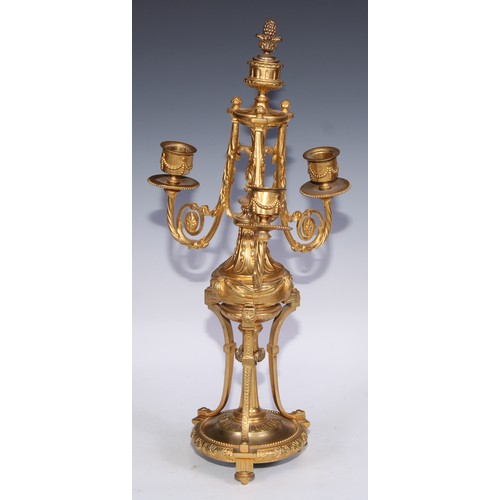 390 - A pair of 19th century French porcelain mounted gilt metal three-light candelabra, in the Louis XVI ... 