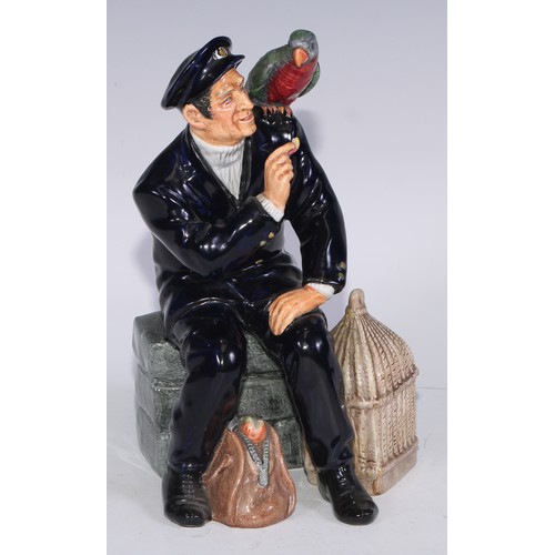 754 - A Royal Doulton figure, The Auctioneer, HN2988, 22.5cm high, printed mark; another, Fat Boy; others,... 