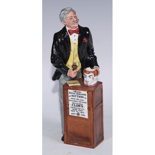 754 - A Royal Doulton figure, The Auctioneer, HN2988, 22.5cm high, printed mark; another, Fat Boy; others,... 