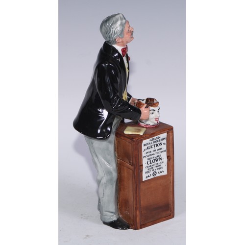 754 - A Royal Doulton figure, The Auctioneer, HN2988, 22.5cm high, printed mark; another, Fat Boy; others,... 