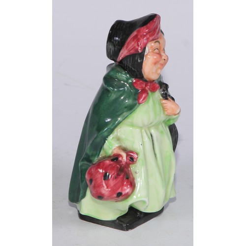 754 - A Royal Doulton figure, The Auctioneer, HN2988, 22.5cm high, printed mark; another, Fat Boy; others,... 