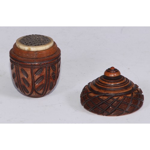 415 - Treen- a 19th century coquilla nutmeg grater, as an acorn, screw-fitting cover enclosing a steel ras... 