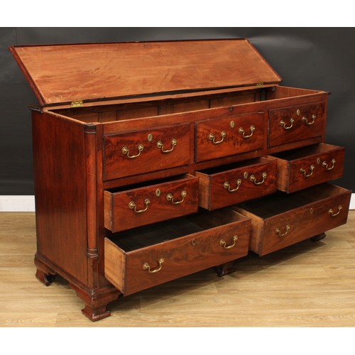 419 - A George III mahogany Lancashire chest, hinged top above an arrangement of drawers, the upper three ... 