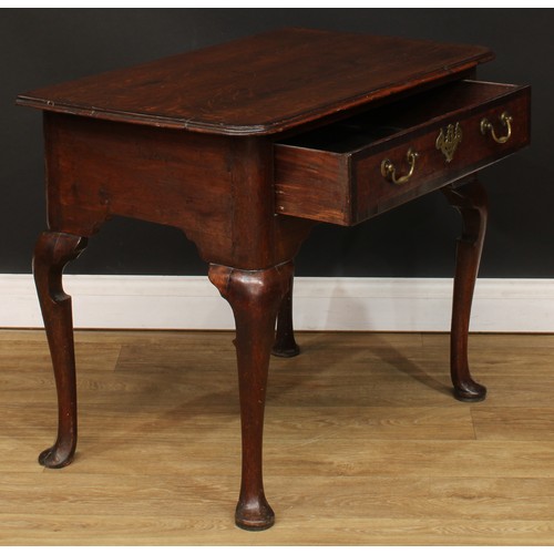 418 - A George III mahogany crossbanded oak side table, slightly oversailing top above a long drawer, bras... 