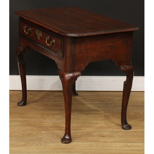 418 - A George III mahogany crossbanded oak side table, slightly oversailing top above a long drawer, bras... 