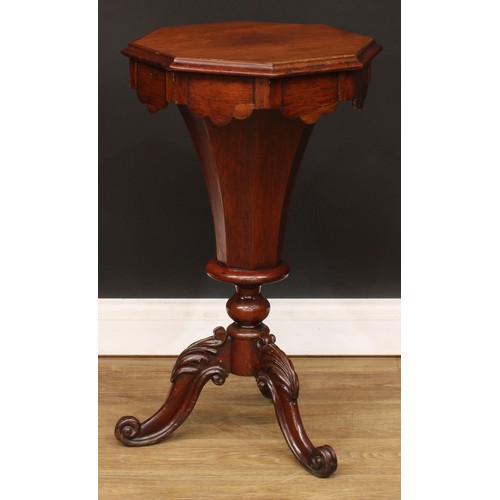 492 - A Victorian trumpet shaped work table, hinged cover, cabriole legs carved to the knees with acanthus... 