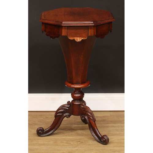 492 - A Victorian trumpet shaped work table, hinged cover, cabriole legs carved to the knees with acanthus... 