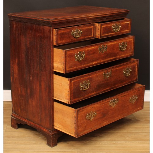 422 - A George III oak chest, rectangular top with moulded edge above two short and three long graduated c... 