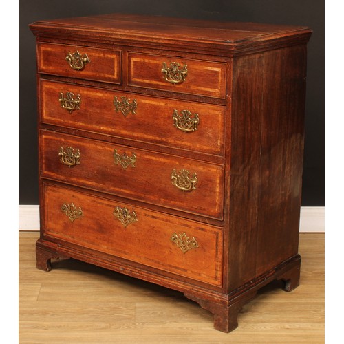 422 - A George III oak chest, rectangular top with moulded edge above two short and three long graduated c... 