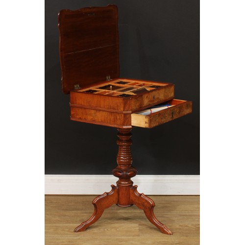 347 - A 19th century walnut and mahogany work table, hinged top enclosing a sliding compartmented interior... 