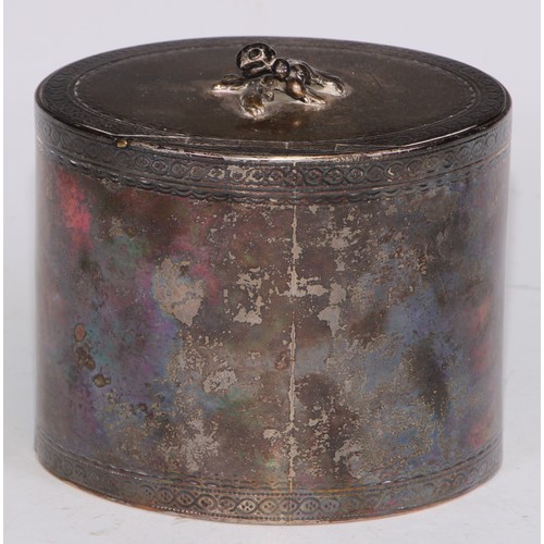 5 - A George III silver oval tea caddy, hinged cover with flower finial, bright-cut engraved with Neo-Cl... 