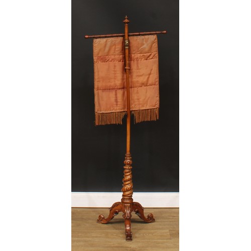 495 - A Victorian walnut pole screen, bead and woodwork banner, spirally turned column, cabriole legs carv... 