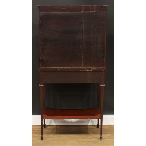 521 - An Edwardian satinwood crossbanded mahogany pier display cabinet, outswept cornice above a glazed re... 