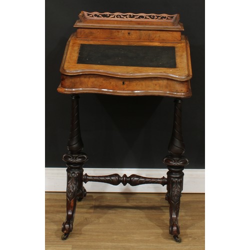 493 - A Victorian walnut ‘Davenport’ desk, hinged rectangular superstructure with shaped and pierced galle... 