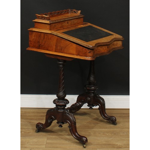 493 - A Victorian walnut ‘Davenport’ desk, hinged rectangular superstructure with shaped and pierced galle... 