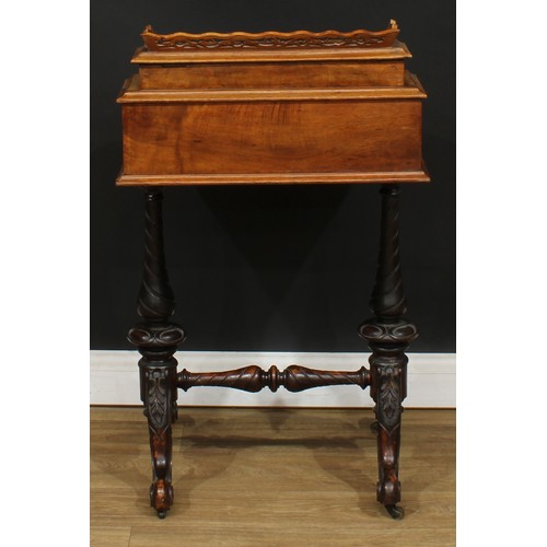 493 - A Victorian walnut ‘Davenport’ desk, hinged rectangular superstructure with shaped and pierced galle... 