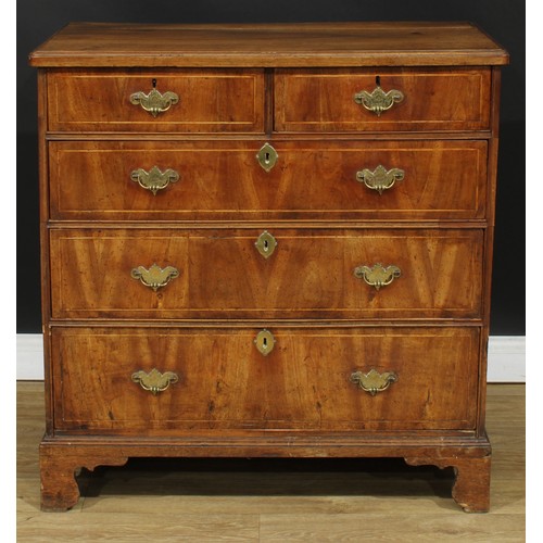 357 - A George II walnut chest, rectangular top above two short and three long graduated drawers, skirted ... 