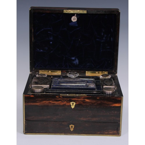 394 - A Victorian brass bound coromandel rectangular dressing box, hinged cover enclosing an arrangement o... 