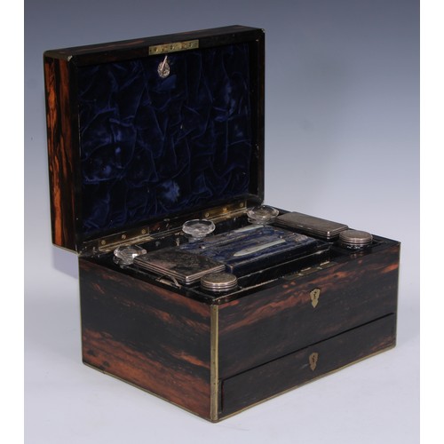 394 - A Victorian brass bound coromandel rectangular dressing box, hinged cover enclosing an arrangement o... 