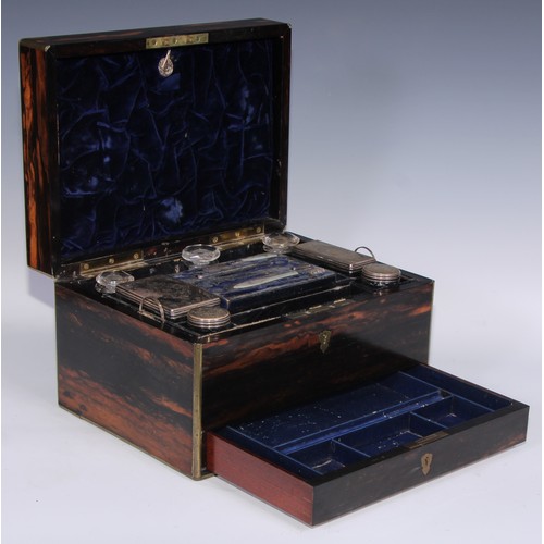 394 - A Victorian brass bound coromandel rectangular dressing box, hinged cover enclosing an arrangement o... 