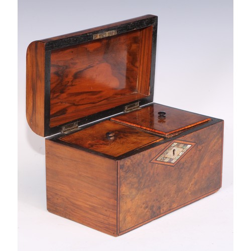 406 - A Victorian walnut domed rectangular tea caddy, hinged cover inlaid with a reserve of mother of pear... 