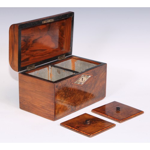 406 - A Victorian walnut domed rectangular tea caddy, hinged cover inlaid with a reserve of mother of pear... 