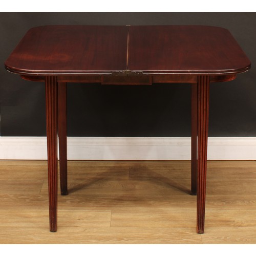 429 - A George IV mahogany D-shaped tea table, hinged top with channelled edge, above a deep frieze centre... 