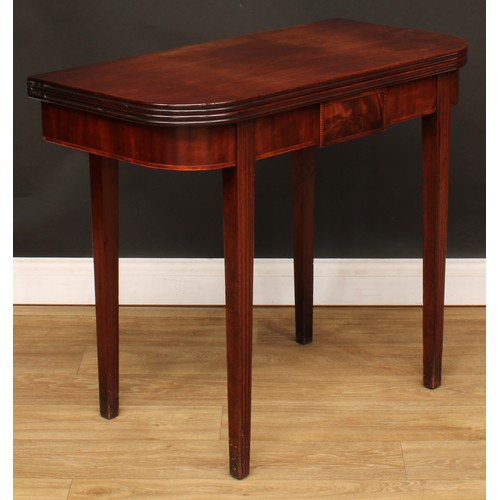 429 - A George IV mahogany D-shaped tea table, hinged top with channelled edge, above a deep frieze centre... 