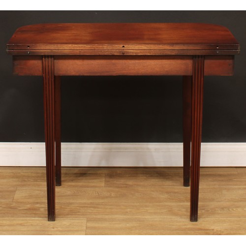 429 - A George IV mahogany D-shaped tea table, hinged top with channelled edge, above a deep frieze centre... 