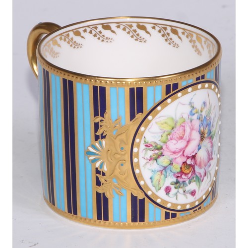 573 - A Lynton Porcelain Company coffee can and saucer, painted by Stefan Nowacki, signed, with a spray of... 