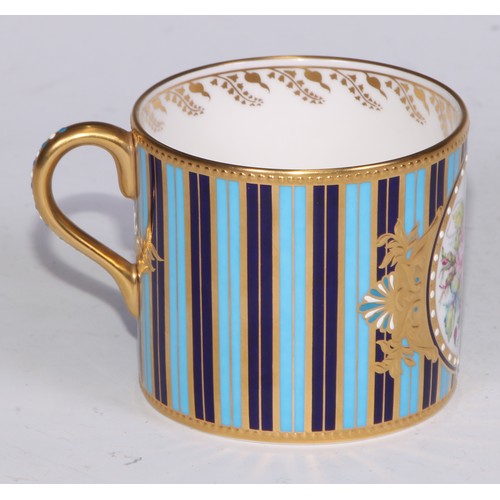 573 - A Lynton Porcelain Company coffee can and saucer, painted by Stefan Nowacki, signed, with a spray of... 