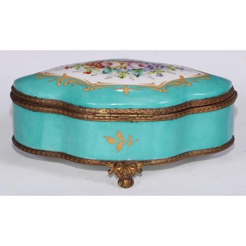 383 - A Continental gilt metal mounted porcelain shaped serpentine casket, decorated with reserves of flow... 