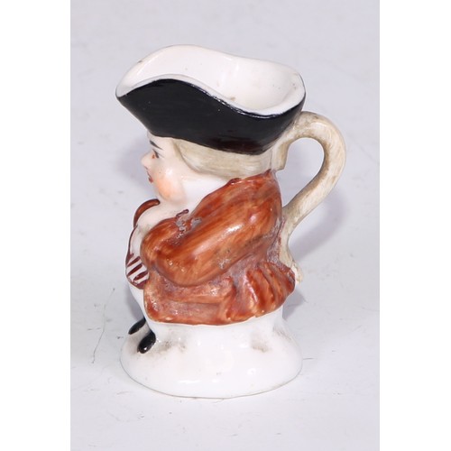 793 - A Sampson Hancock Derby miniature toby jug, 4.5cm high, red mark; others, similar (6)