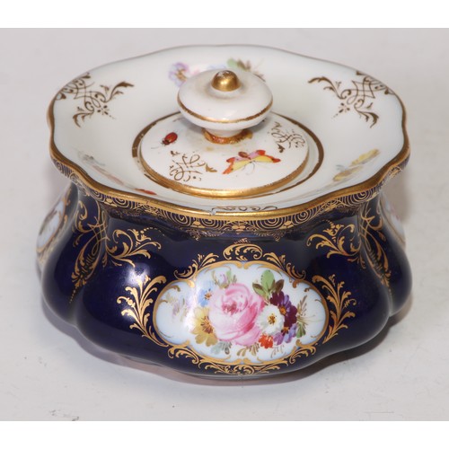 737 - A Meissen lobed circular inkwell and cover, decorated with reserves of summer flowers, picked out in... 