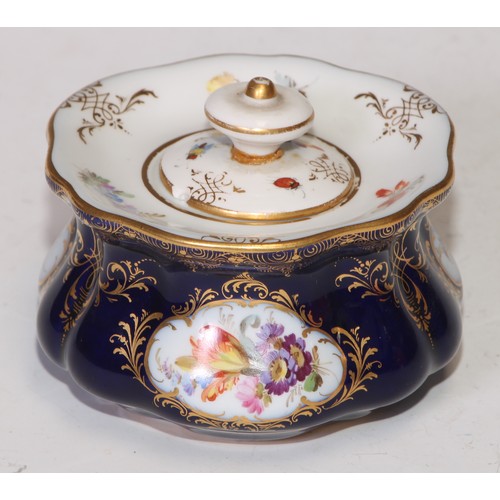 737 - A Meissen lobed circular inkwell and cover, decorated with reserves of summer flowers, picked out in... 