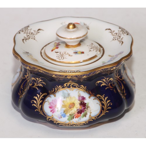 737 - A Meissen lobed circular inkwell and cover, decorated with reserves of summer flowers, picked out in... 