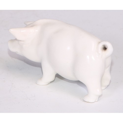 804 - A Sampson Hancock model, of a pig, in the white, 8.5cm long, blue mark; a bird, 11cm high, red mark ... 