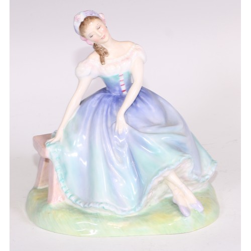 748 - A Royal Doulton bust length figure, Gladys, modelled as a young Art Deco lady leaning on a ledge, 17... 