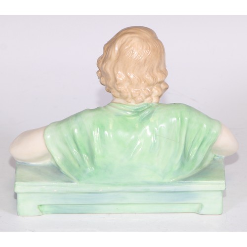 748 - A Royal Doulton bust length figure, Gladys, modelled as a young Art Deco lady leaning on a ledge, 17... 