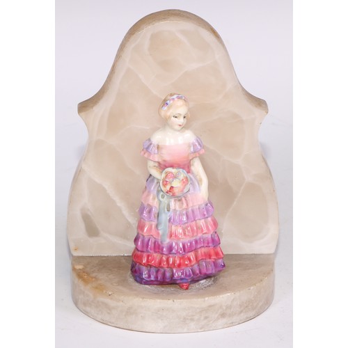 748 - A Royal Doulton bust length figure, Gladys, modelled as a young Art Deco lady leaning on a ledge, 17... 