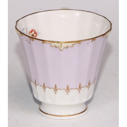 722 - A 19th century Spode bat printed coffee can; Imari cups and saucers