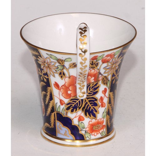 722 - A 19th century Spode bat printed coffee can; Imari cups and saucers