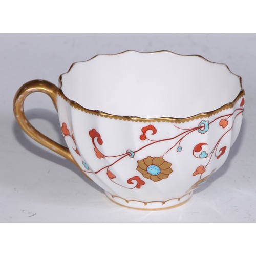 674 - A Derby coffee can, painted with pattern no.594 on a gilt lattice ground, 6cm high, puce mark, c.179... 