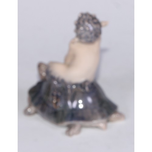 744 - A Royal Copenhagen figure, Faun on a Turtle, 10cm high, printed marks; other models, dogs; etc (6)