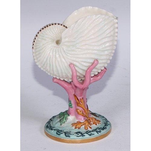 814 - A Royal Worcester vase, naturalistically modelled as a nautilus shell upon a coral specimen, 16cm hi... 