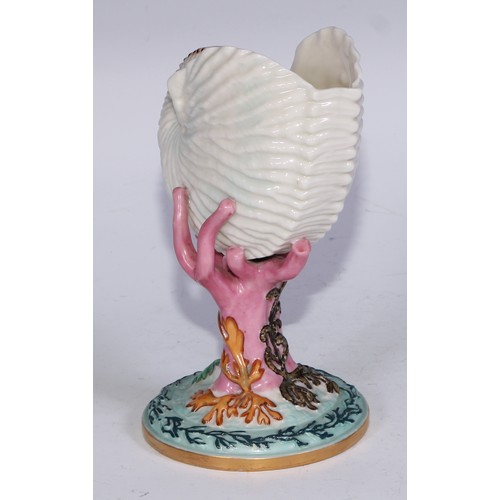 814 - A Royal Worcester vase, naturalistically modelled as a nautilus shell upon a coral specimen, 16cm hi... 