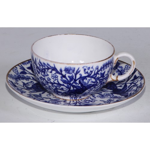 595 - A Derby Crown Porcelain tea service, printed in tones of underglaze blue, the lobed oval tray 45cm w... 