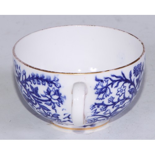 595 - A Derby Crown Porcelain tea service, printed in tones of underglaze blue, the lobed oval tray 45cm w... 