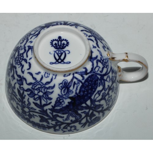 595 - A Derby Crown Porcelain tea service, printed in tones of underglaze blue, the lobed oval tray 45cm w... 